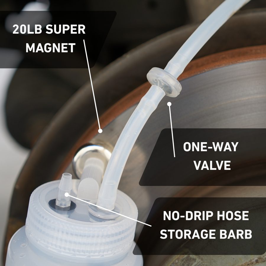 Close-up of the 20 lb cap-mounted super magnet, one-way valve, and no-drip hose storage barb