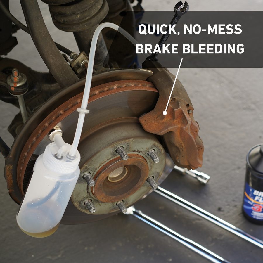Cal-Spec brake bleeder bottle magnet-mounted at the rotor during a quick no-mess brake bleed